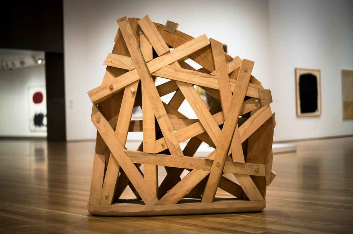 00_38 by Nick Patterson. An angular wooden sculpture standing in a gallery.