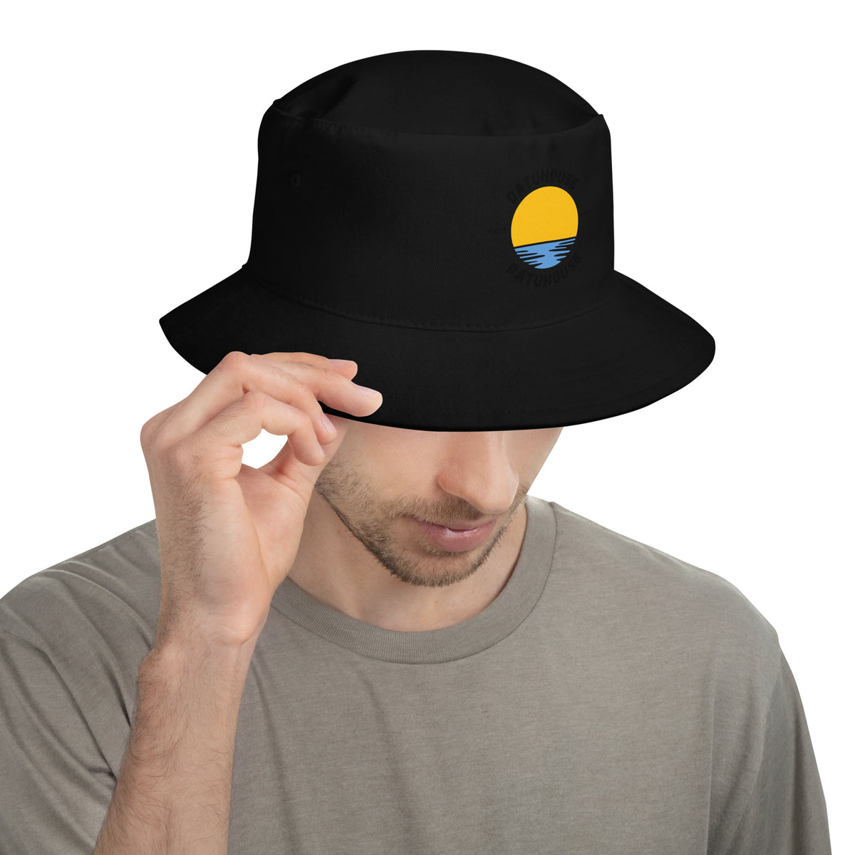 DATU Sunrise Bucket Hat — Black worn by a model, front view #color_black