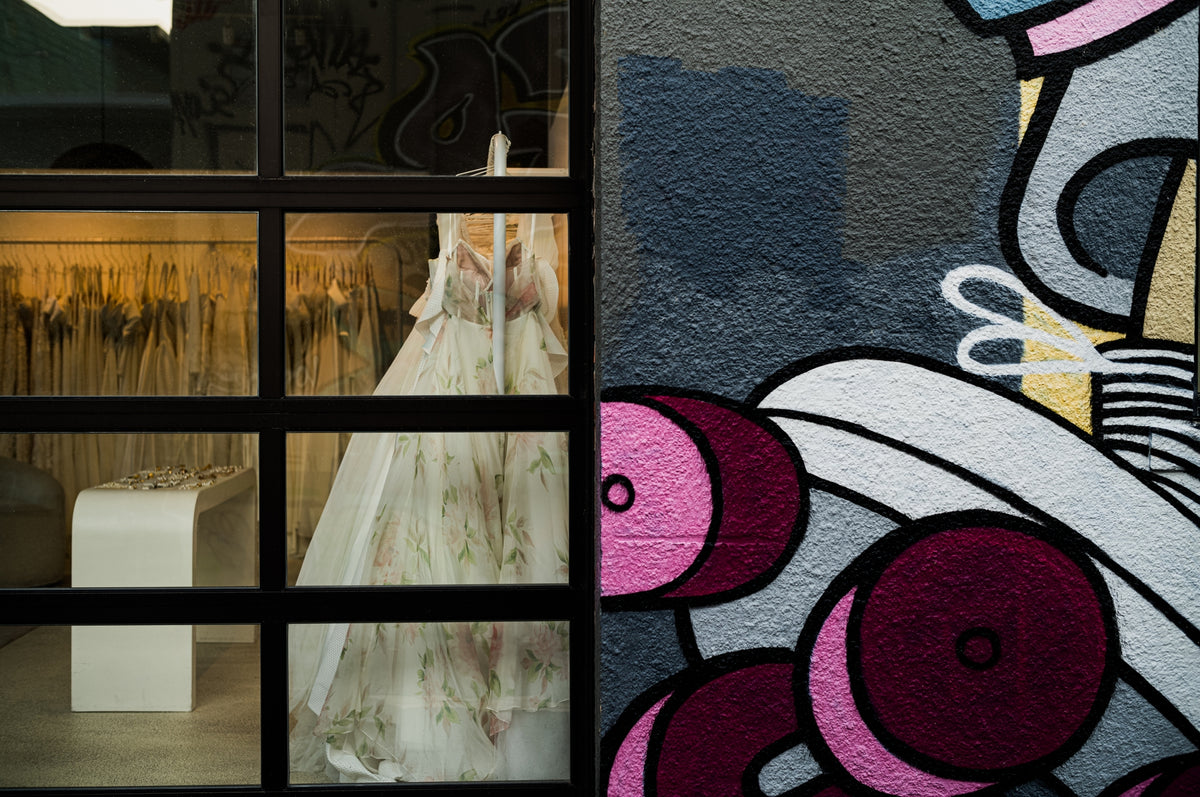 00_22 by Nick Patterson. A window beside a wall painted with colorful shapes.