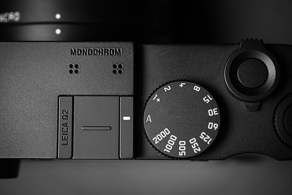 Black-and-white overhead view of the Leica Q2 Monochrom controls.