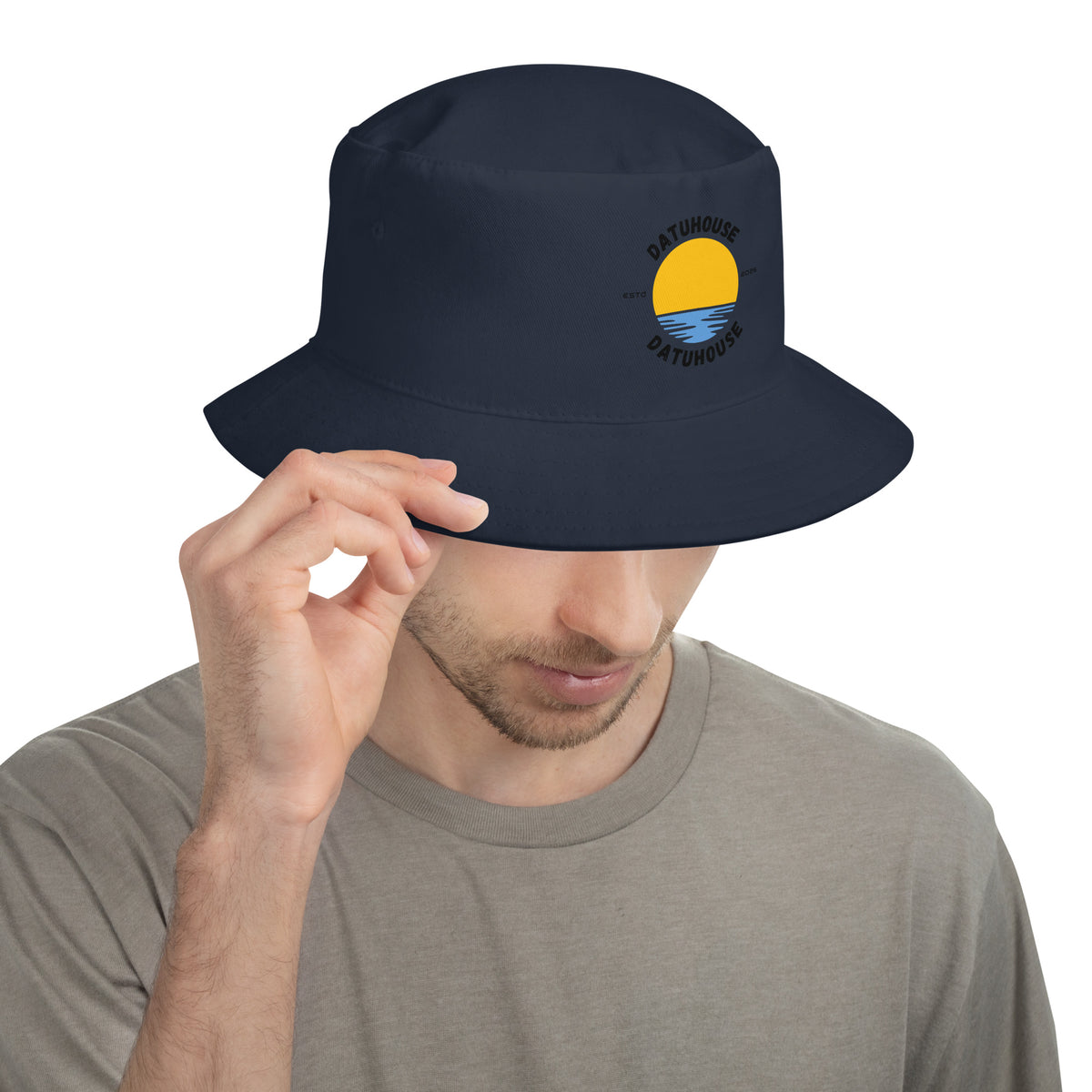 DATU Sunrise Bucket Hat — Navy worn by a model, front view #color_navy